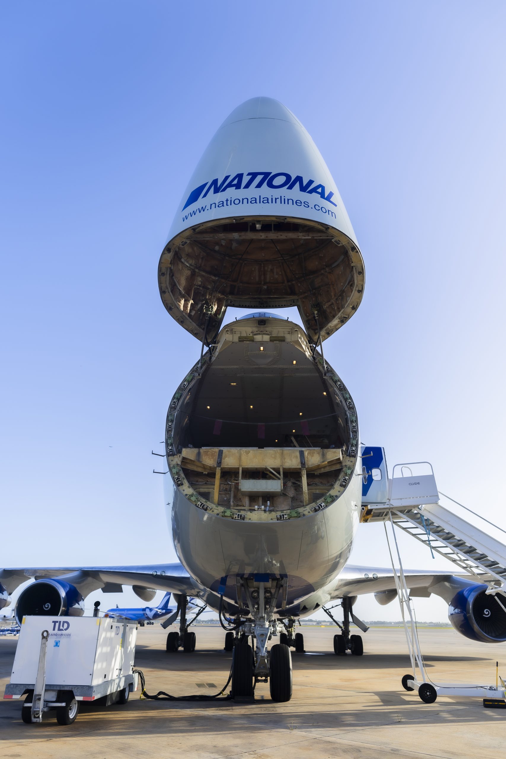 An airplane with the nose open