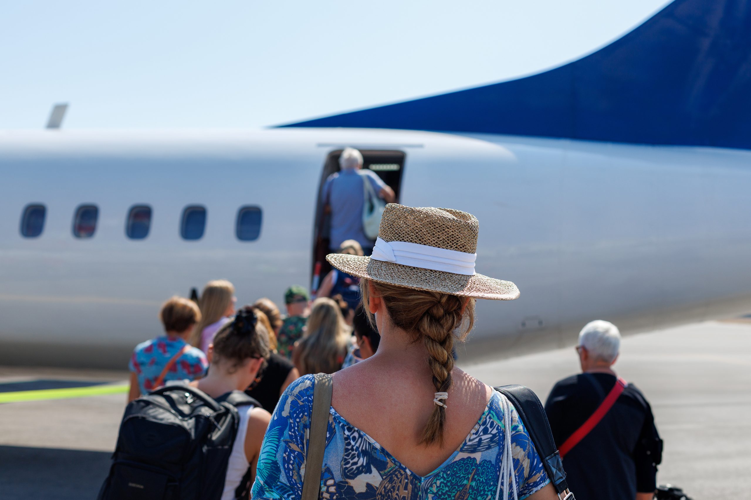 People boarding an airplane