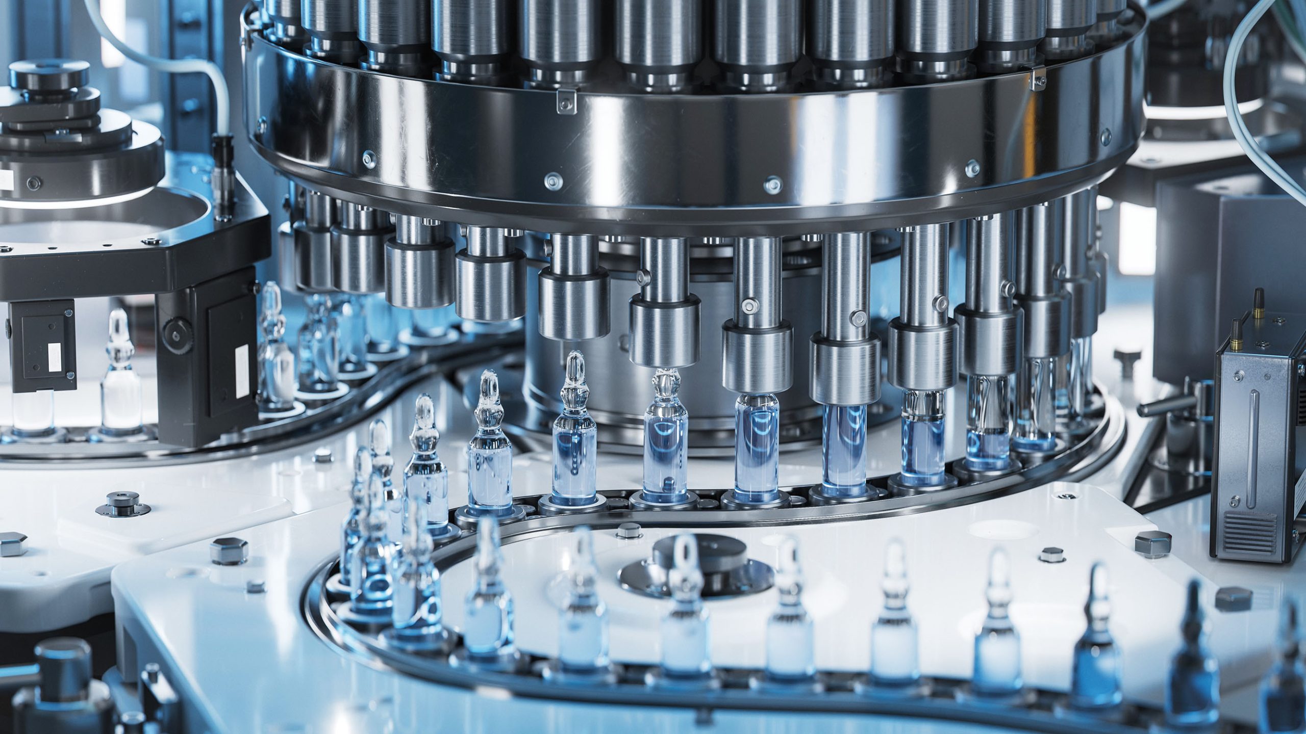 Pharmaceuticals being handled by machinary
